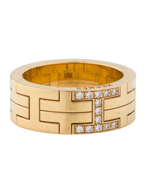 hermes 18k diamond ring.